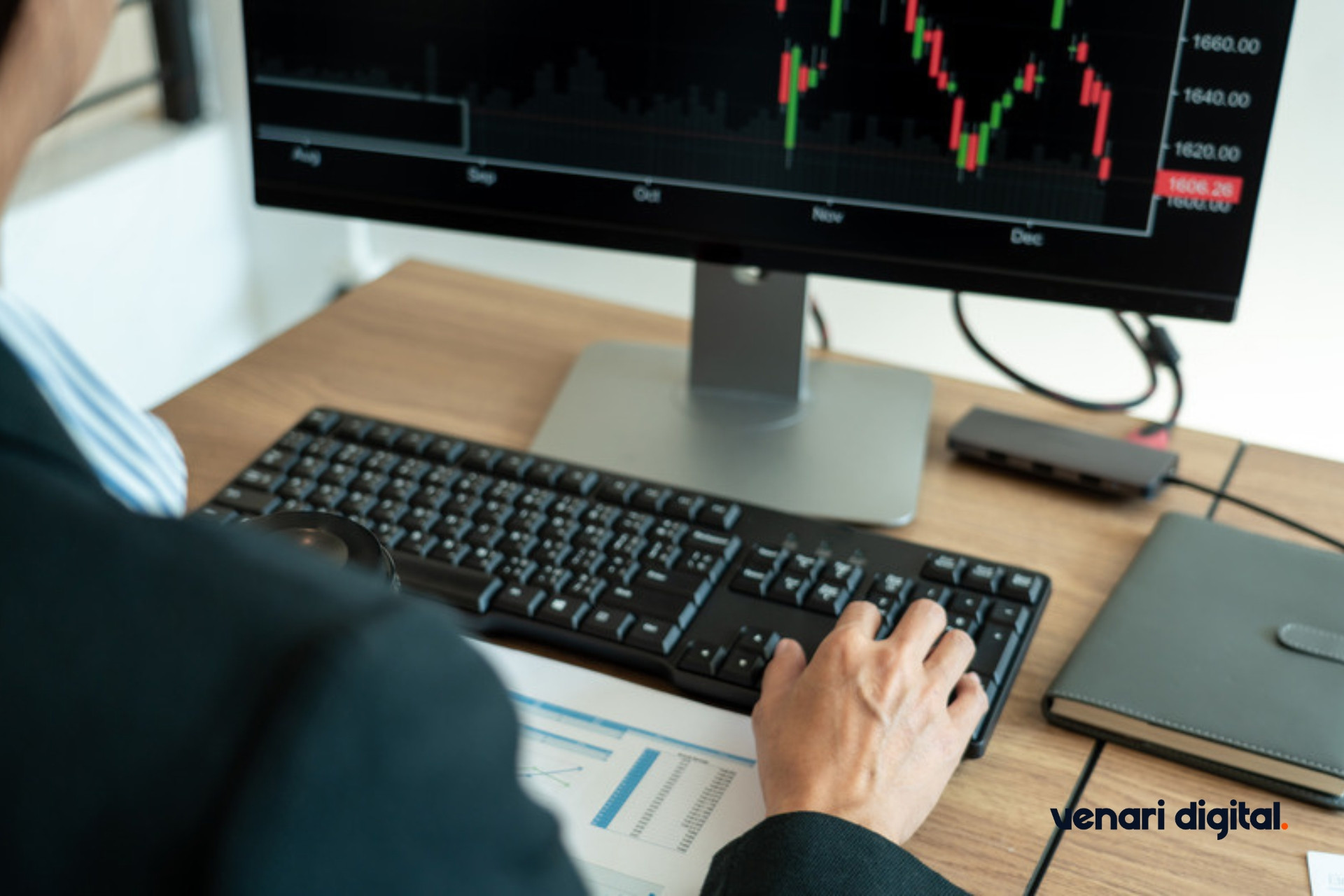 Investor following a share price chart on a monitor